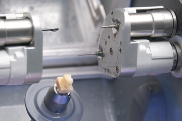 CAD CAM dental computer-aided machine. Digital modern dental laboratory for prosthesis and crowns milling.