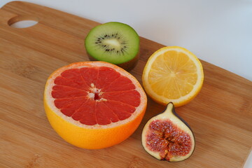 Fruits, citrus fruits and exotic. Cut in half. High quality