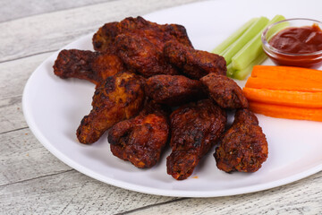 Chicken wings bbq with celery and carrot
