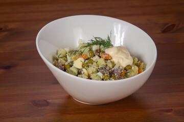 Traditional Russian salad with meat