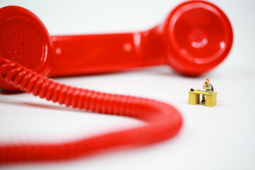 rotary phone earpiece with the busy worker