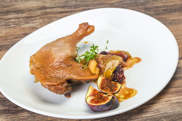Roasted. duck. leg with plum and apple