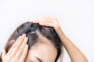 Young asian women worried about hair loss problems, Hiar care concept