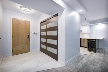 Real estate photography - Beautiful empty renovated apartment in an apartment building with bathroom, new kitchen, new floors, all white painted