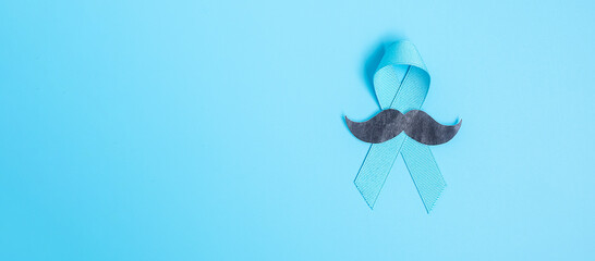 November Prostate Cancer Awareness month, light Blue Ribbon with mustache for supporting people...