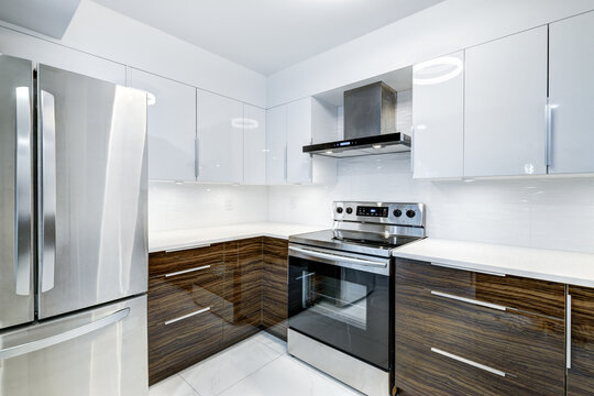 Real estate photography - Beautiful empty renovated apartment in an apartment building with bathroom, new kitchen, new floors, all white painted