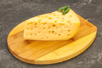Maasdam cheese - yellow triangle with holes