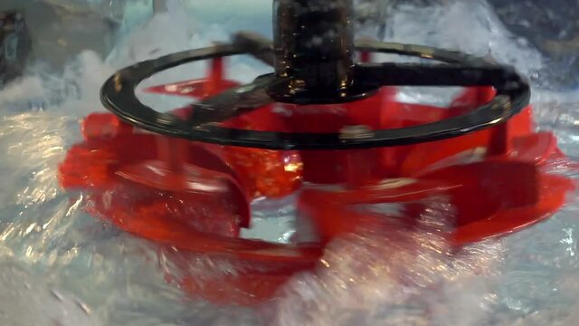 Oxygenation of water using a rotating element