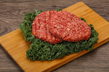 Raw beef burger cutlet for cooking