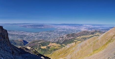 Fototapeta premium Timpanogos hiking trail landscape views in Uinta Wasatch Cache National Forest, around Utah Lake, in the Rocky Mountains in fall. Views of Midway, Heber, Provo city, Salt Lake and Utah County. USA.