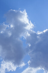 White clouds cumulus floating on blue sky for backgrounds concept