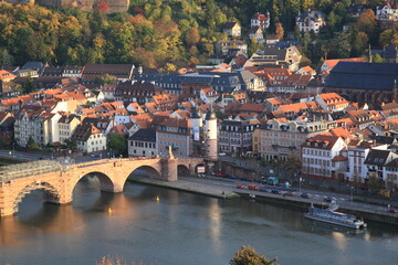 Fototapeta na wymiar Aerial view of Heidelberg old town with Old Bridge over the river Neckar during sunset in autumn in Heidelberg, Germany