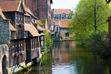 Fototapeta na wymiar Canal at the back of the Gruuthuuse Palace, Historic centre of Bruges, Belgium, Unesco World Heritage Site.