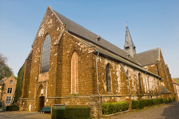 Fototapeta premium Diest beguinage, Church Saint Catharina, Belgium, Unesco World Heritage Site.