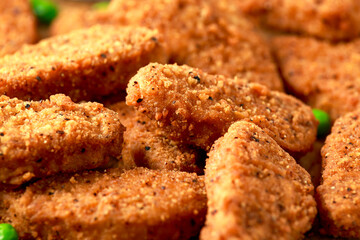 Vegetarian vegan southern style crispy nuggets served with sweet potato chips and beer