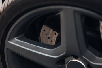 Car braking system. Sport car front wheel brake disc