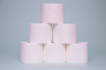 Toilet paper on a green background. Hygiene product.