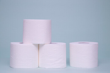 Toilet paper on a green background. Hygiene product.