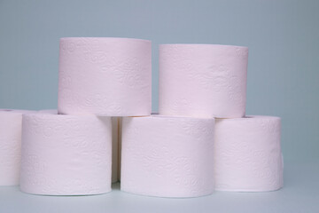 Toilet paper on a green background. Hygiene product.