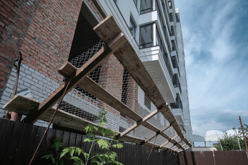 Construction site with crane and building, bottom view