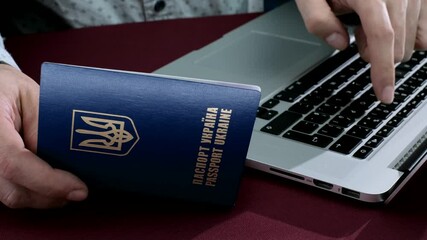 Ukraine citizen insert data from International Travel document Passport for buy fly ticket or registration. Visa Application online Form Immigration Concept - Powered by Adobe