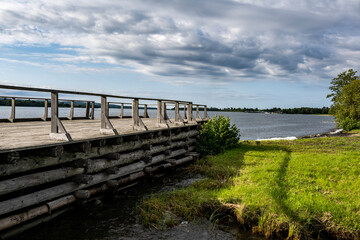 Fototapeta premium rural scenery with gray wooden pier on island