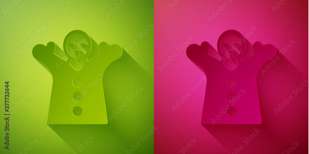 Sticker Paper cut Toy puppet doll on hand icon isolated on green and pink background. Paper art style. Vector.