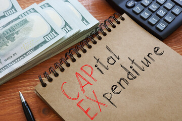 CAPEX capital expenditure is shown on the conceptual business photo - obrazy, fototapety, plakaty
