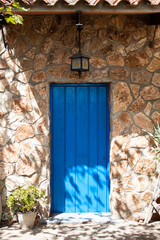 Fototapeta na wymiar Entrance door in a rustic country house.