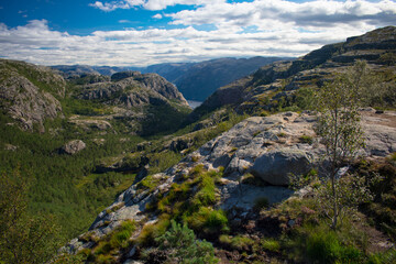 Fototapeta na wymiar Hiking trail to Preikestolen Mountain top with tourist near Stvanger Norway