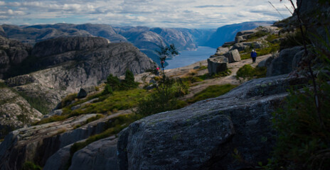 Hiking trail to Preikestolen Mountain top with tourist near Stavanger Norway
