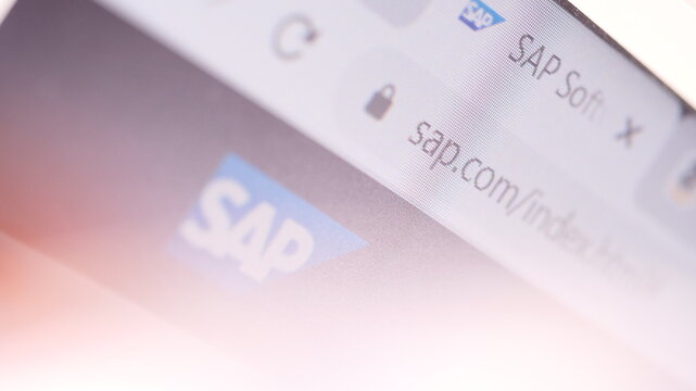 Website of SAP SE in browser and logo on the computer screen. Editorial macro shot
