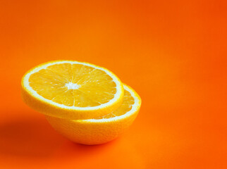 lemon slices on orange background