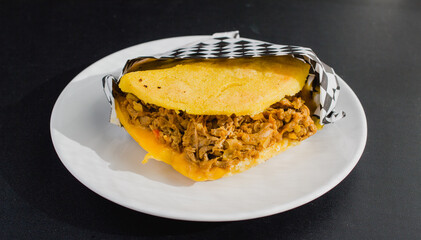 Isolated arepa on a dish