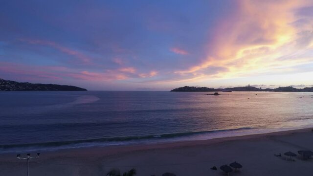 Sunset in the bay of Acapulco during the covid-19 pandemic
