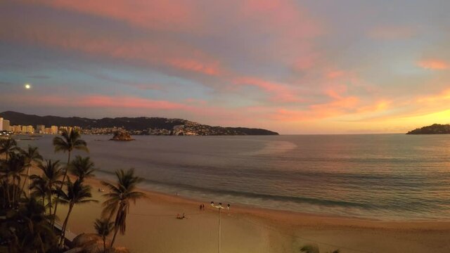 Sunset in the bay of Acapulco during the covid-19 pandemic