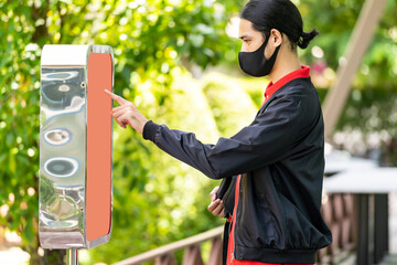 Delivery man order and picking up from kiosk at restaurant