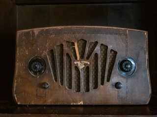 Very old and worn out wooden valve radio