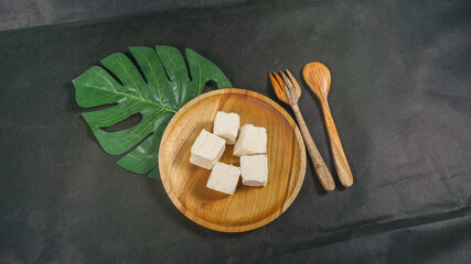 Tahu or Tofu is a popular traditional Indonesian food, and is made from vegetable ingredients namely soybean.
