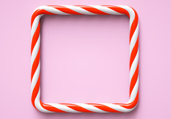 Classic red and white striped christmas candy color frame on pink background. Frame with copy space for candy bar. 3D rendering and 3D illustration.