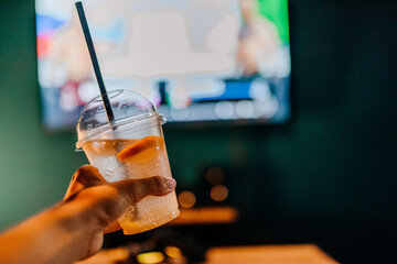 cold cocktail in hand
