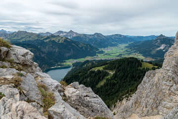 View from the mountain Schartschrofen to the valley of Tannheim and the lake Haldensee in Austria