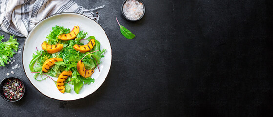 salad grilled peach lettuce leaves mix raw nectarine serving size top view copy space