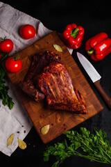 Smoked BBQ ribs on black background