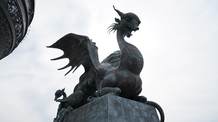 Fototapeta premium Dragon statue on white background