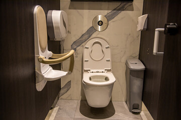 mother care publc toilet equipment. cubicle of a public toilet equipped Folding toddler safety...