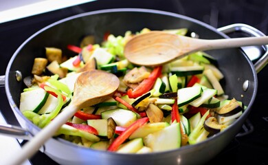 Stir fry fresh vegetable in the pan.
