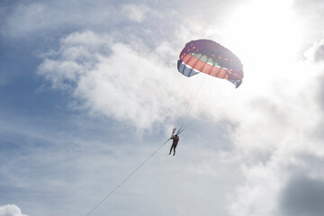 Parasailing in the sky with boat at cox's bazar