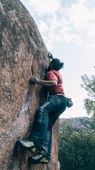 Rock Climber Reaching the Top