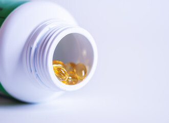 Pill spilling out of a bottle